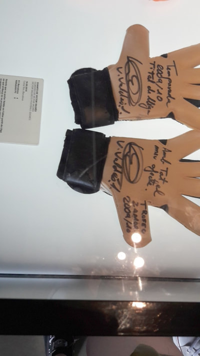 These goalie gloves belonged to Barcelona goalie Victor Valdés.